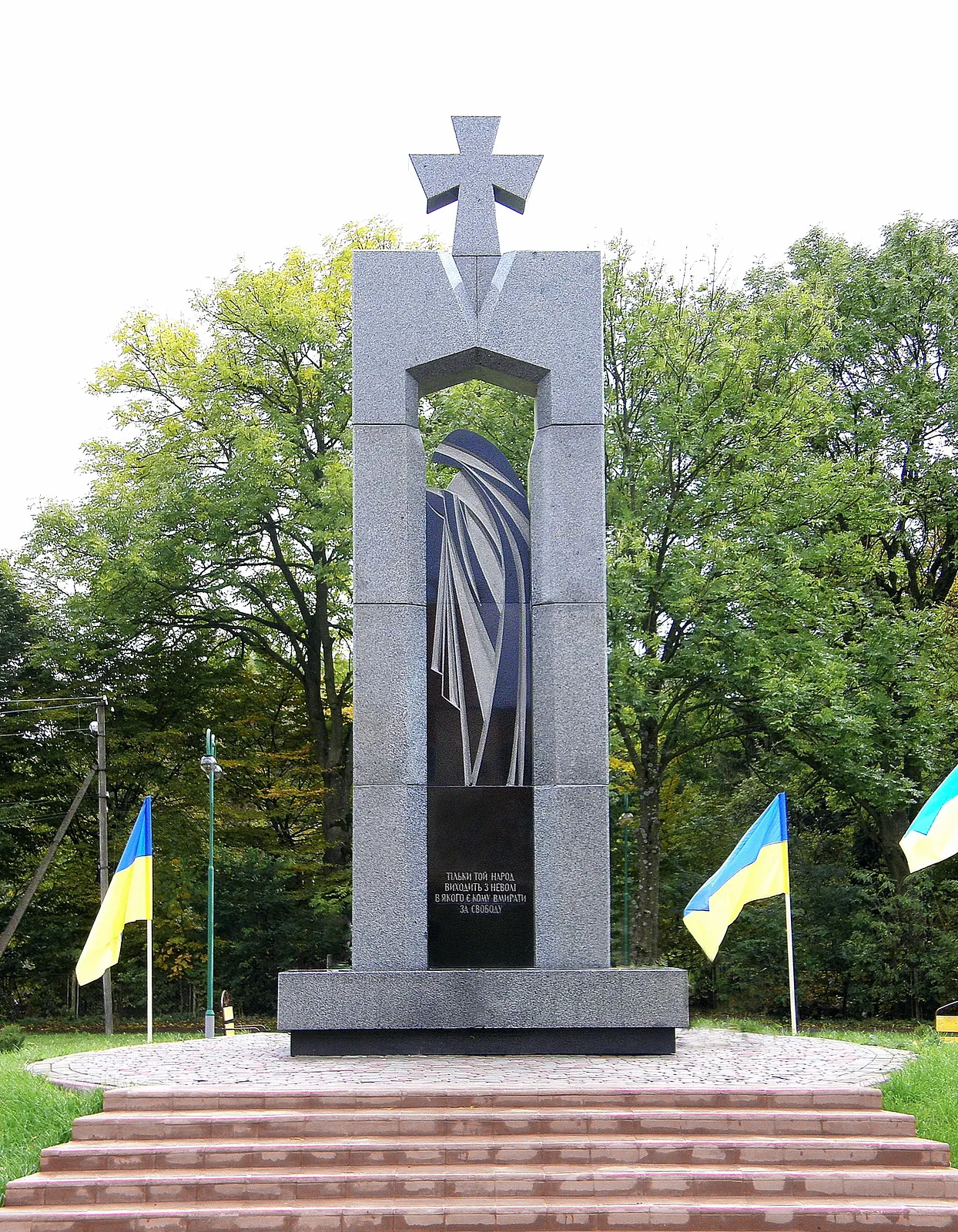 Image of Stele to the fallen warriors "FIGHTERS FOR UKRAINE`S FREEDOM" by Roman Kykta, size: 6500/3000/2000 мм, made of Stone: granite, gabbro, Sculpture Monuments medium, from village. Obroshino, Lviv region. Photo 2 of 3.